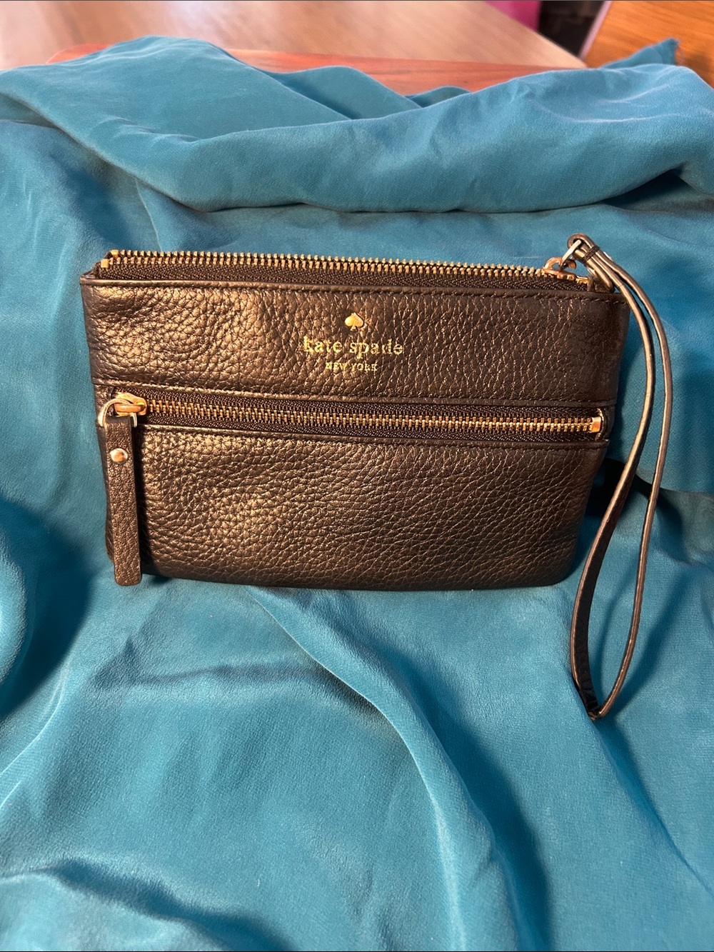 kate spade black pebbled leather wristlet with gold hardware